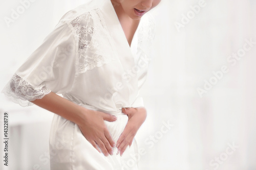 Young woman suffering from ...