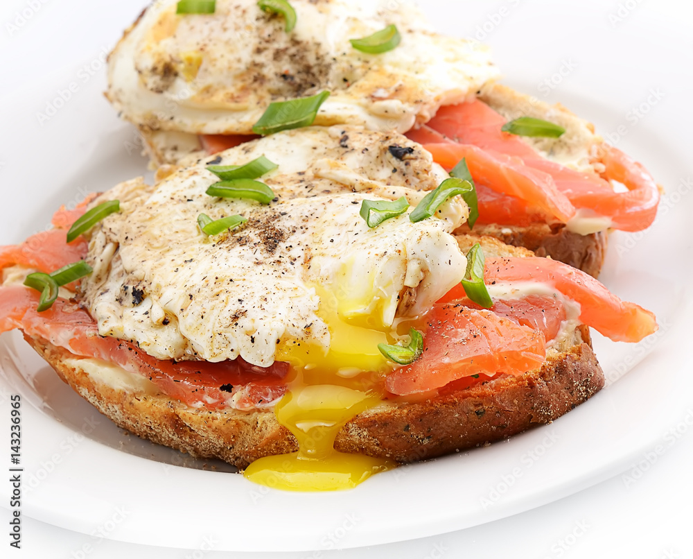 Traditional Norwegian breakfast. Sandwich eggs with salted fish and onions. Traditional Norwegian breakfast. Sandwich eggs with salted fish and onions.