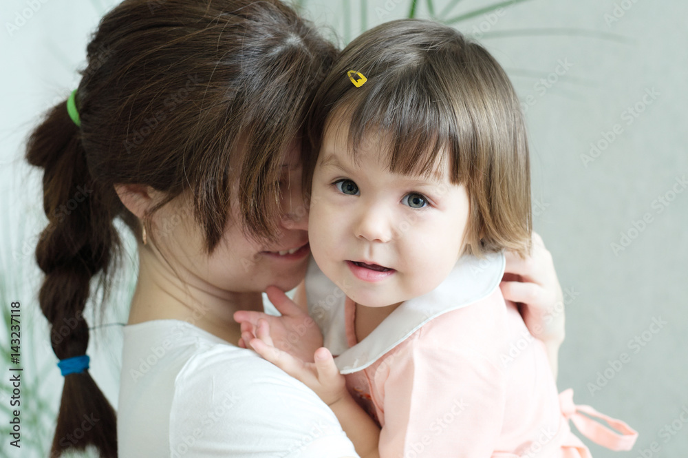 Mother hugging child, physical contact, family relationships, cuddling baby for physical affection, communicate happy daughter,happy childhood for little girl, mother holding child, lovely maternity Mother hugging child, physical contact, family relationships, cuddling baby for physical affection, communicate happy daughter,happy childhood for little girl, mother holding child, lovely maternity