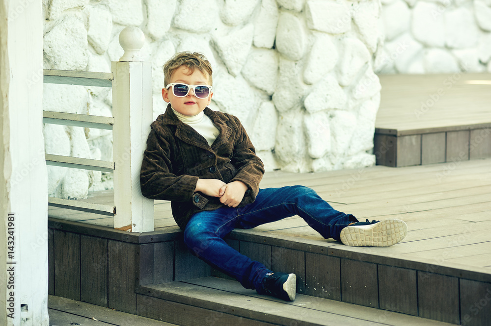 stylish portrait of a boy with glasses .Children's fashion