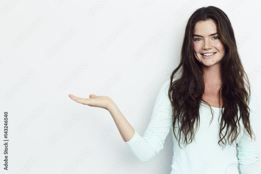 Portrait of beautiful brunette gesturing to camera Portrait of beautiful brunette gesturing to camera