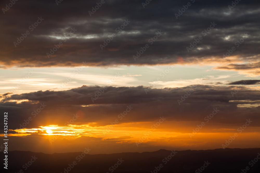 colorful dramatic sky with cloud at sunset