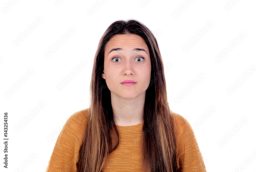 Surprised teenager girl with yellow jersey Surprised teenager girl with yellow jersey