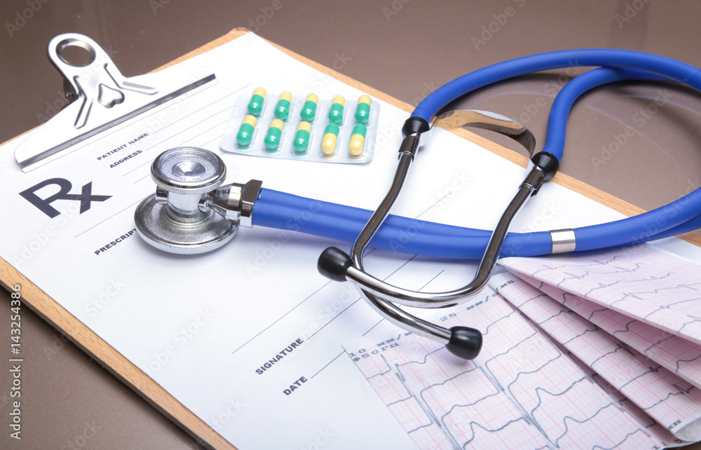 RX prescription, Red heart and a stethoscope on white background RX prescription, Red heart and a stethoscope on white background