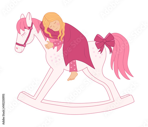 little sleeping girl on a rocking horse