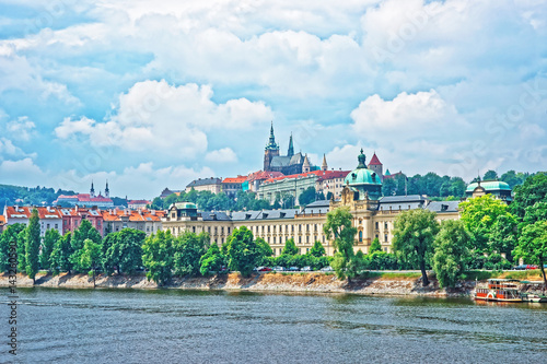 Vltava River embankment with Prague Old Town with Strakova Academy