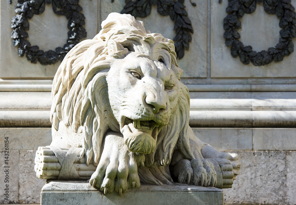 Marble lions at a small square in Naples, Italy