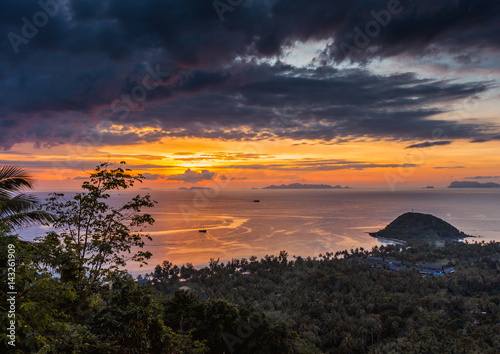 Sunset on the sea, view from the island