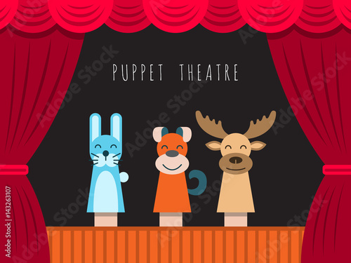 Fototapeta Childrens performance in the puppet theater at the theater with price, curtain and scenery