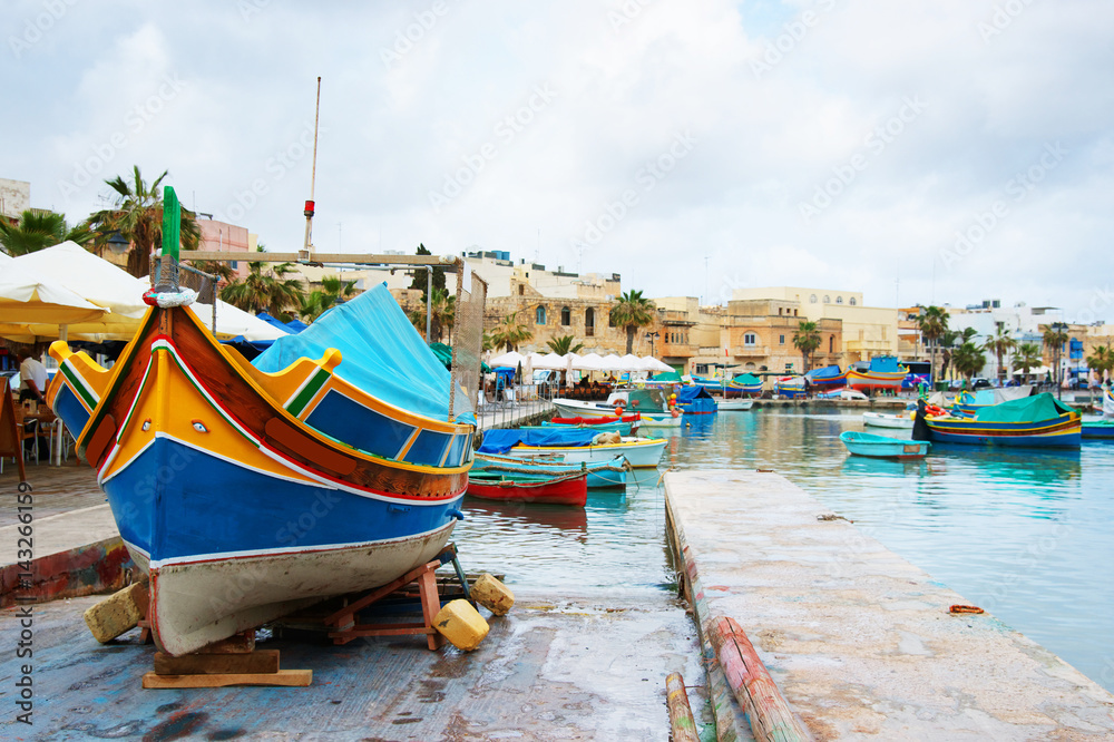 Luzzu colorful boat at Marsaxlokk Harbor Malta