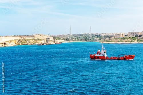 Dry cargo vessel at Grand Harbor in Valletta  Malta © Roman Babakin