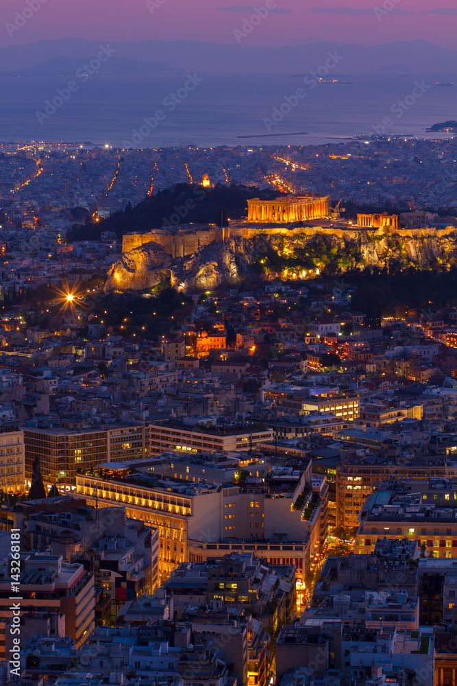 cityscape of Athens with Acropolis hill, Pathenon and sea at night, Greece