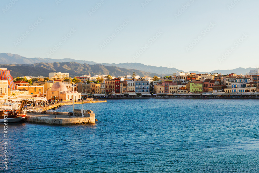 venetian habour of Chania with historical houses at sunny summer day, Crete, Greece