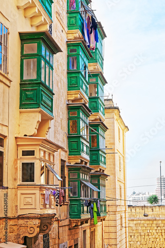 Traditional green balconies in Valletta old town