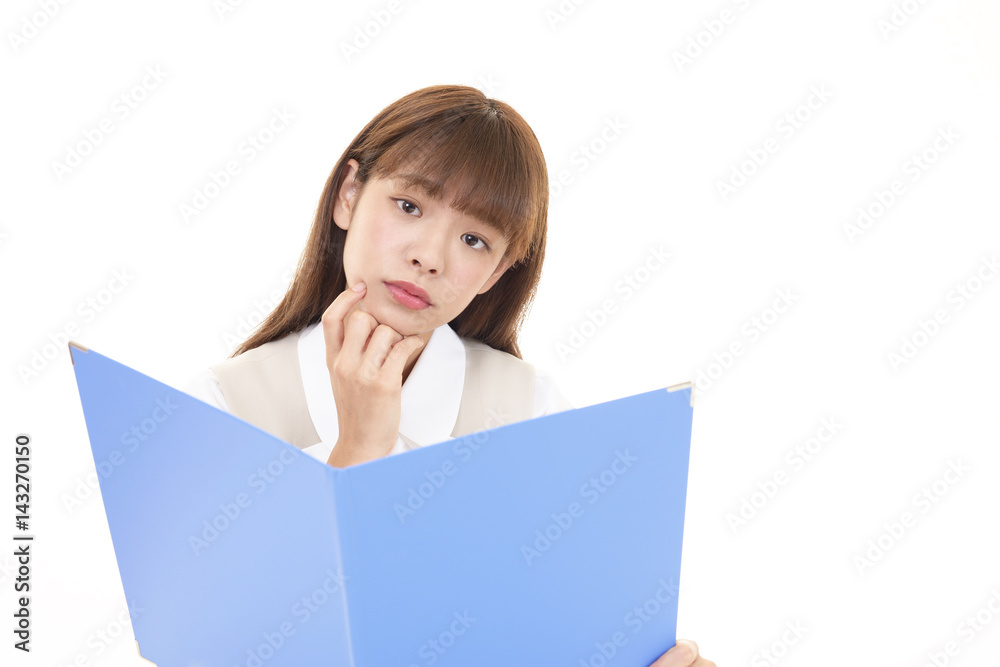 不安そうな表情のビジネスウーマン 不安そうな表情のビジネスウーマン