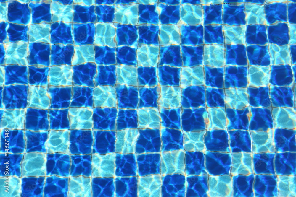 Abstract Blue mosaic tiles of swimming pool water for background Abstract Blue mosaic tiles of swimming pool water for background