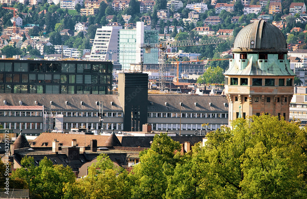 Telescope dome and rooftops in Zurich