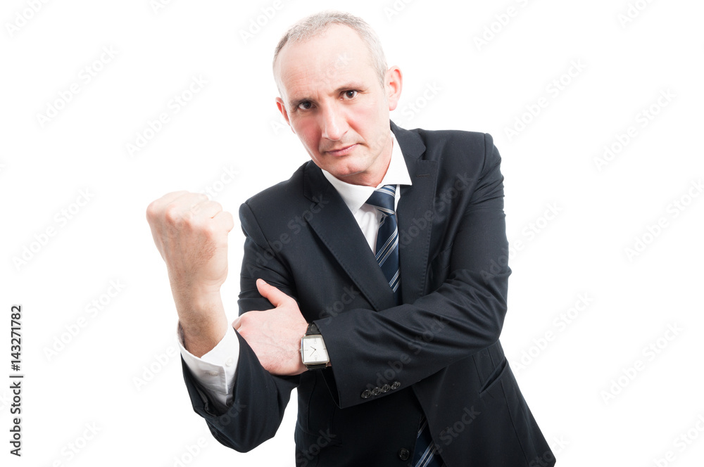 Middle aged elegant man showing obscene gesture