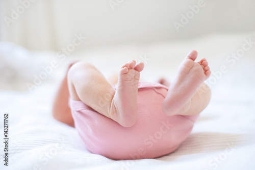 Feet of newborn baby with copyspace