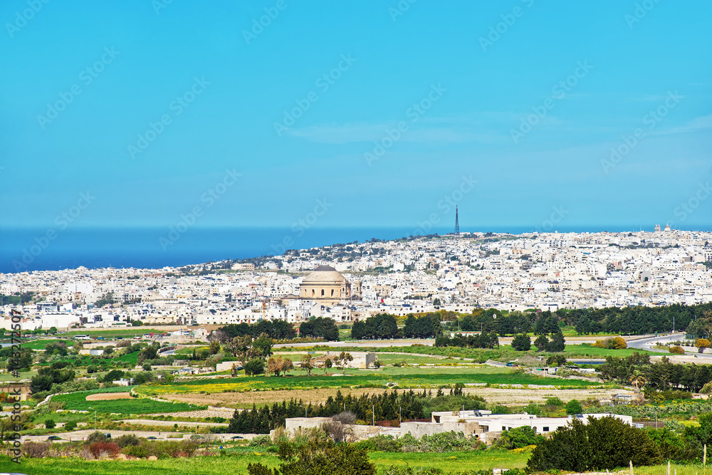 Mosta skyline with Rotunda and old city seen from Rabat