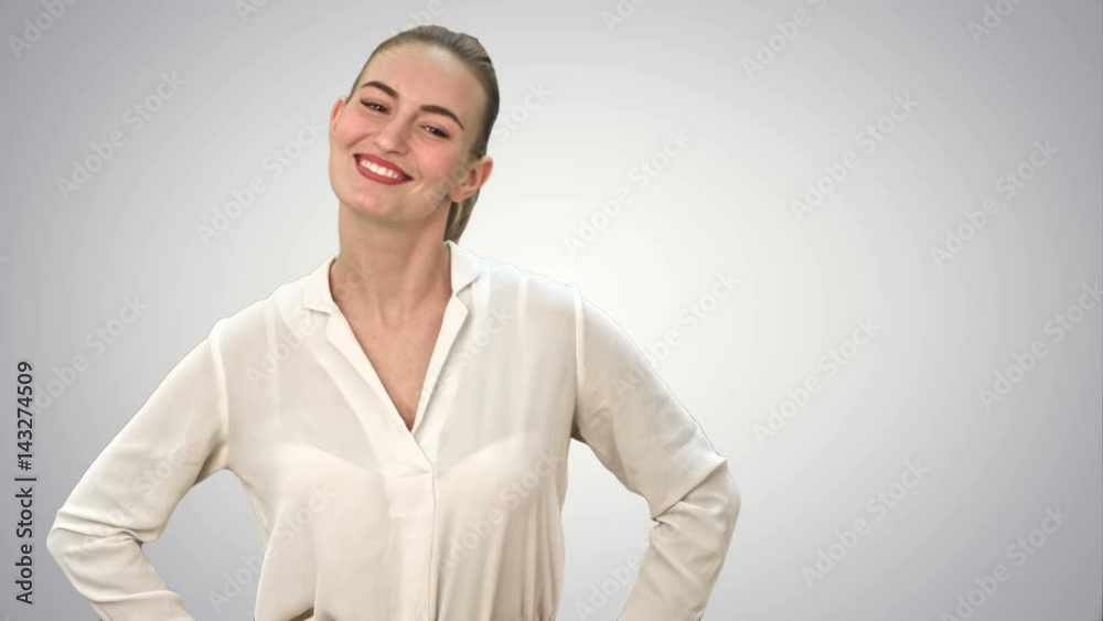 Young pretty businsswoman throws paper document pages on white background. Young pretty businsswoman throws paper document pages on white background.