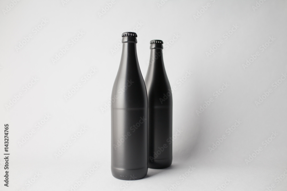Two beer bottles on the scene, mock-up. Two beer bottles on the scene, mock-up.