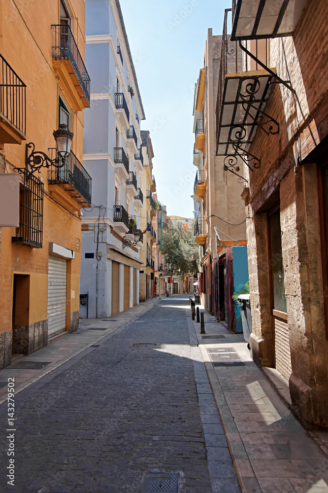 Narrow street in old city center of Valencia