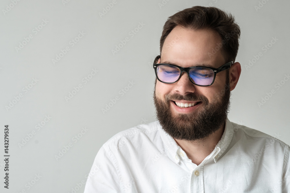 Handsome man laugh out loud with eyes closed Handsome man laugh out loud with eyes closed
