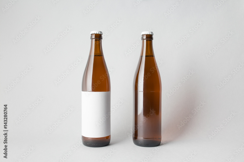Two beer bottles on the scene, mock-up. Two beer bottles on the scene, mock-up.