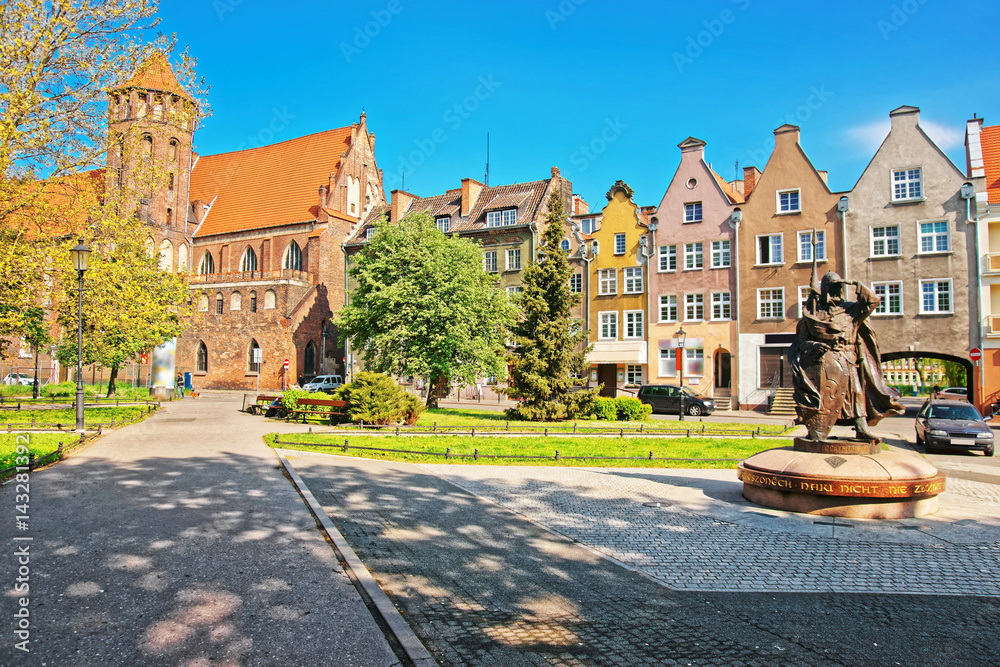 Statue of Duke of Gdansk and St Nicholas Church Gdansk