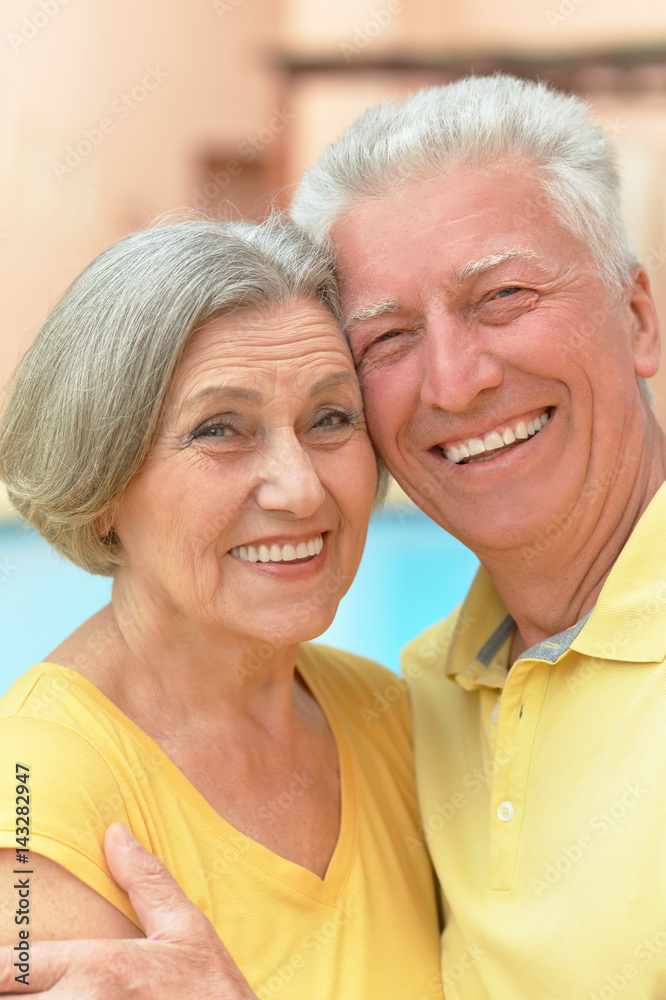 Happy elderly couple embracing Happy elderly couple embracing