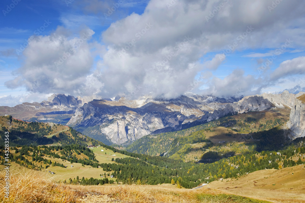 Autumnal landscape of the italian Alps seen from Sella Pass, Dolomites, Northern Italy, Europe