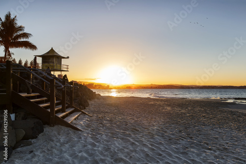 Sun setting over the ocean, viewed from Snapper Rocks beach Gold Coast.