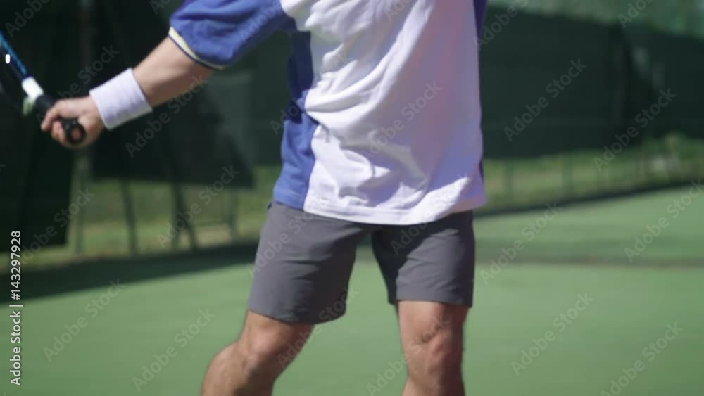 tennis player hitting the ball slow motion close up tennis player hitting the ball slow motion close up
