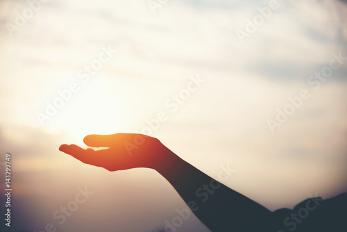 silhouette of woman pointing with finger in sky, relax concept