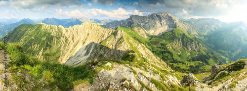 Great panoramic view to mountains and valley in summer light