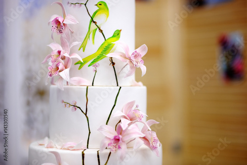 Traditional anniversary/wedding multi-layer cake with flowers
