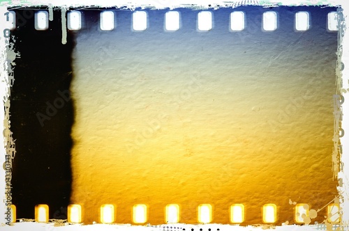 Vintage blue and sepia film strip frame with worn borders. Plaster textured.