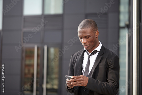 young african american businessman using smart phone