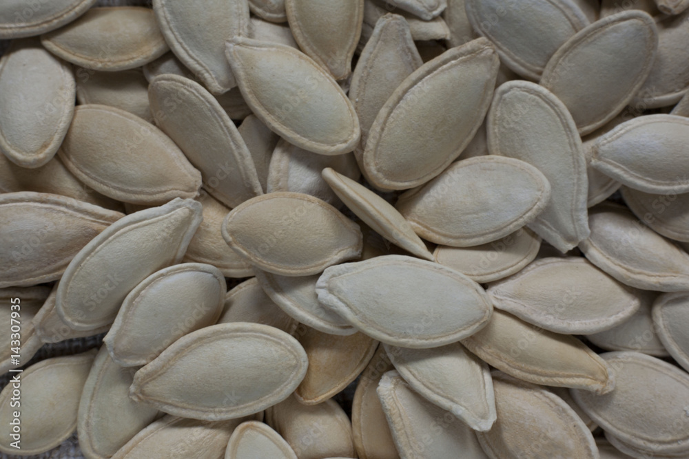 Nature pumpkin seeds background. Autumn food Nature pumpkin seeds background. Autumn food