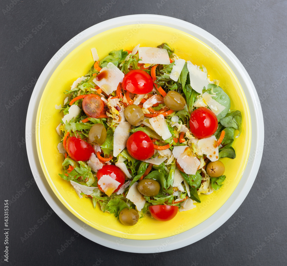 Mixed salad on black slate. Mixed salad on black slate.