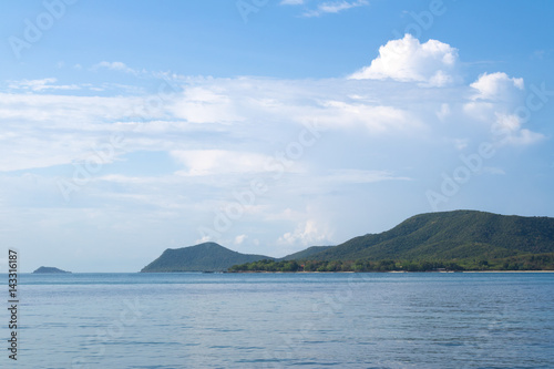 Seascape with island and blue sky. Samae San island, Thailand.