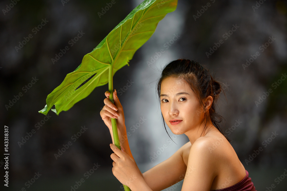 young woman relaxing in hot springs,Woman enjoy onsen in Thailand,Asian