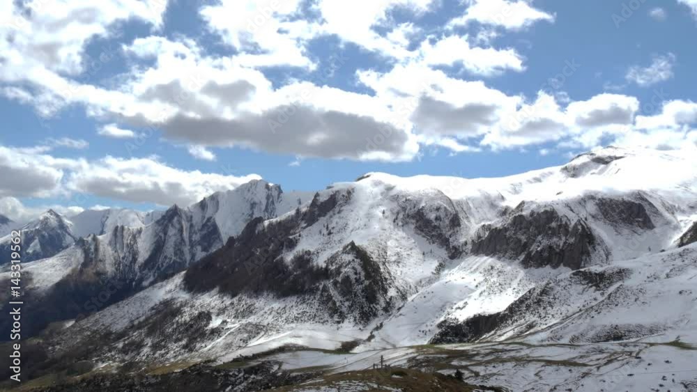 view of the french Pyrenees mountains in spring time with snow