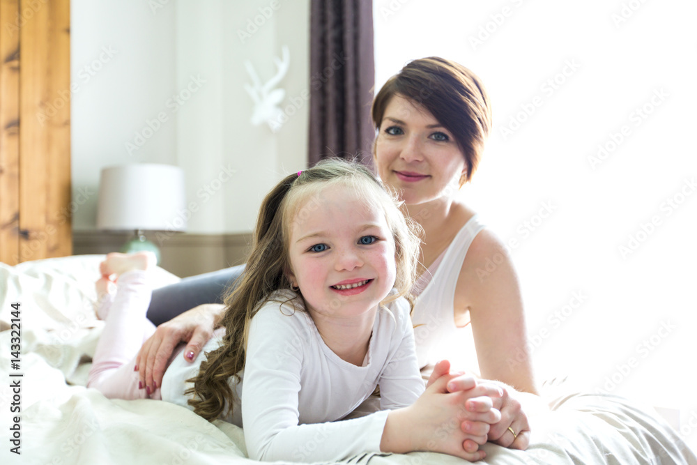 Happy loving family. Mother and her daughter child girl playing Happy loving family. Mother and her daughter child girl playing