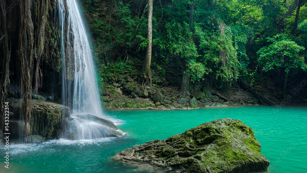Fototapeta premium Green nature with green waterfall landscape, Erawan waterfall located Khanchanaburi Province, Thailand