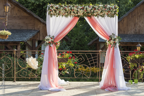 Arch at the wedding ceremony flowered