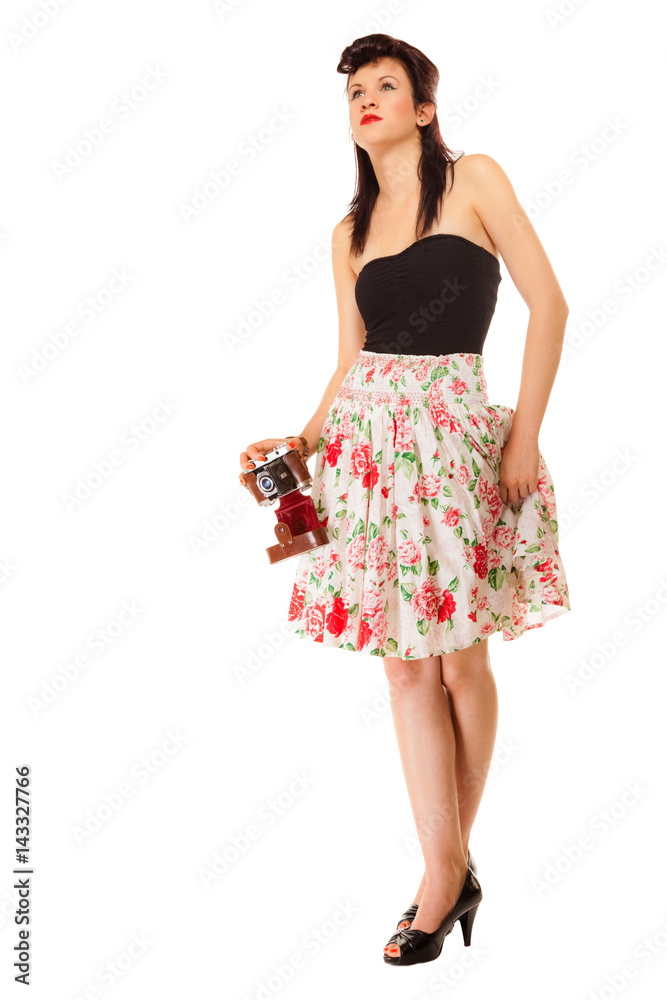 Teen girl with old camera