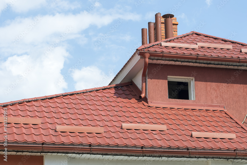 red tile roof with window