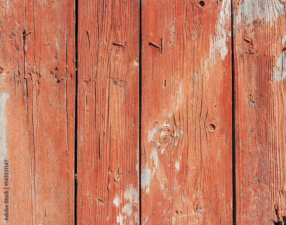 Naklejka premium Wood texture. Red painted old door